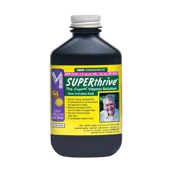 120ml of Superthrive packaged in black cylindral bottle with silver screw cap.